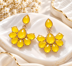 Yellow floral dangle earrings with faceted teardrop accents | SISTERHOODS-SHA256:b30b8dc448c4a94ce6b13df04579f415cff37e459cbf4109c38cbe2171b80d65