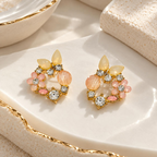 Multicolour floral stud earrings with peach, pink, yellow and clear faceted accents | SISTERHOODS-SHA256:c2595721eb45cd812d3216f8bf4b6b21d5c523507406b277b6845d0c55fc39df