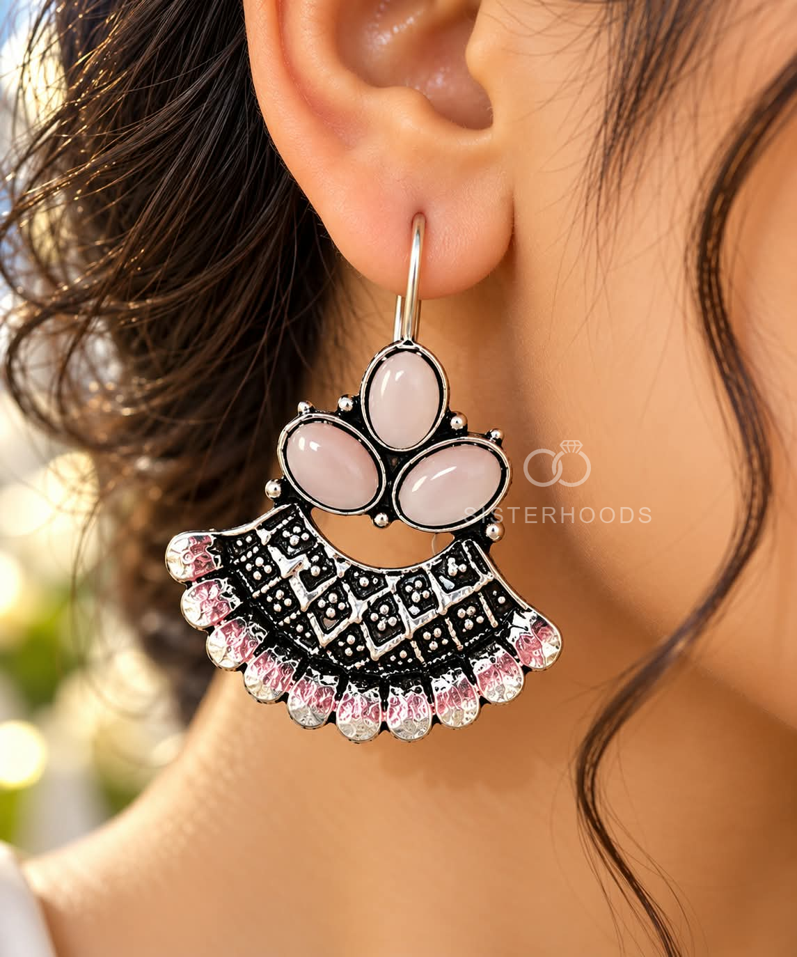 Oxidized silver jhumka earrings with pink floral accents and detailed bell-shaped drops | SISTERHOODS-SHA256:d8409421d13d713924fff90c4002e3a245c59c300805700522f199a8ab0d1e18