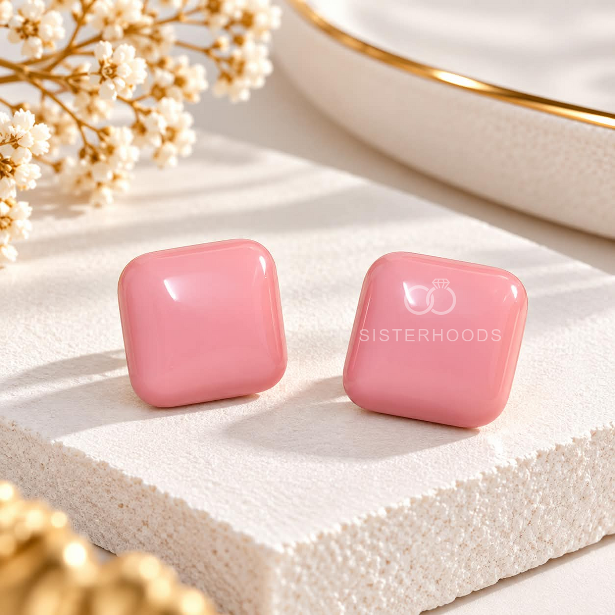 Pink square stud earring worn on an ear | SISTERHOODS-SHA256:612eb5dbe11ef892b3a35b2616f9141128034f3247de22844e46407c2d5ff587