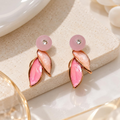 Pink layered leaf dangle earrings with sparkling centre accents | SISTERHOODS-SHA256:506738b3579decbcf2e0a30c91bc8973dad9dd05473f38caa1145516f65d23b7