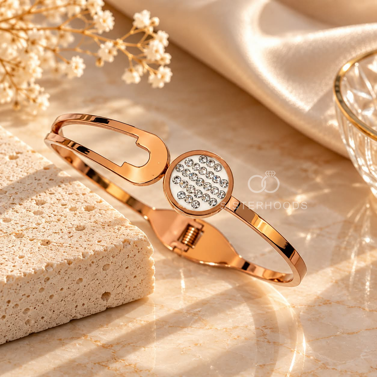Rose gold-tone open cuff bracelet with round clear stone-studded centre | SISTERHOODS-SHA256:7d248559ee6adcac44344c74caf7381af0759cc33625ae47630c8cfd3f227394