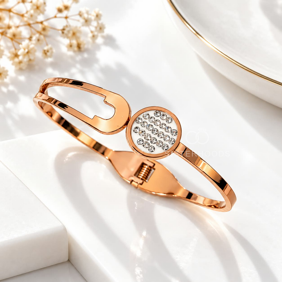 Rose gold-tone open cuff bracelet with round clear stone-studded centre | SISTERHOODS-SHA256:596bd7a6e019c11b44bf6a13aff74ccf563356e754fbd2fcaeb6440a3f8a0054