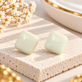 Pair of pale green rounded square stud earrings | SISTERHOODS-SHA256:824d4a80dab67b5fdd9a6b0a80eea6125c122ab6e3fd6dd7278647b21c9ee80b
