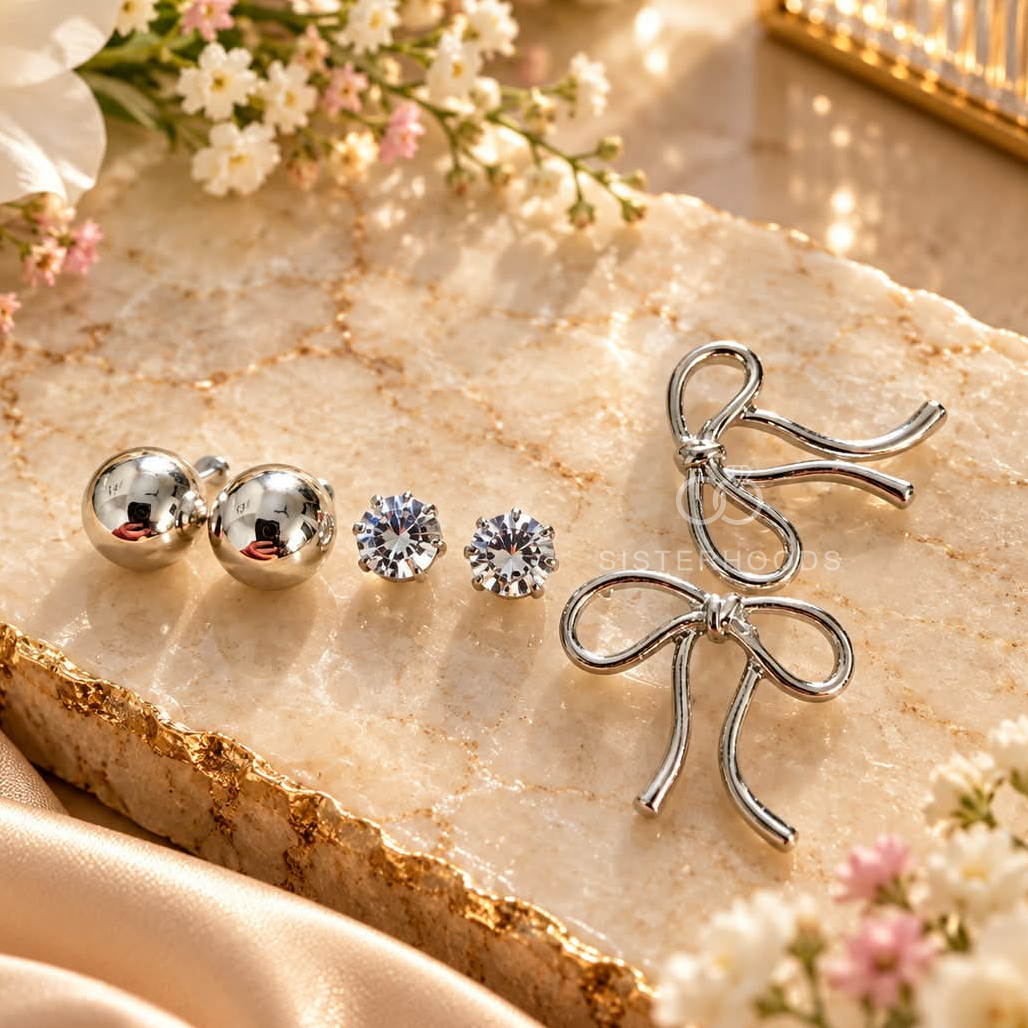 Silver ball, sparkle and bow stud earrings set | SISTERHOODS-SHA256:e73e374bcfa89650d2773941145a6339c4ed50c8f1e5a7e6244c4746c63fa49a