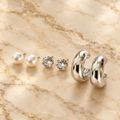 Three pairs of pearl, crystal and silver-toned stud earrings | SISTERHOODS-SHA256:f59afff9ea5c4c4ddaec4a76eab3a2b1797cb223cd21a252a1befd94ce8ebebf