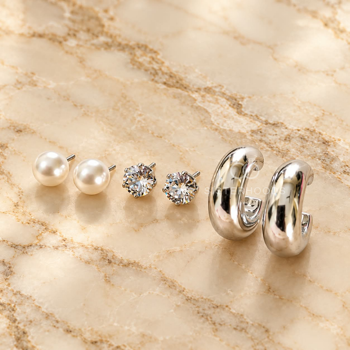 Three pairs of pearl, crystal and silver-toned stud earrings | SISTERHOODS-SHA256:f59afff9ea5c4c4ddaec4a76eab3a2b1797cb223cd21a252a1befd94ce8ebebf
