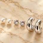 Three pairs of pearl, crystal and silver-toned stud earrings | SISTERHOODS-SHA256:38b5d4c6271a621a3f7e04106573de636b319da0f1af9ecc93a2cecad47390e5