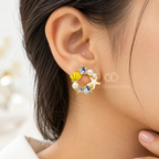 Gold-tone statement earrings with pearls, seashells, starfish and sparkling accents | SISTERHOODS-SHA256:38535878fa4ddfb09eab80abc178c10ce3bea617884a06d8db86e3695573e3a5