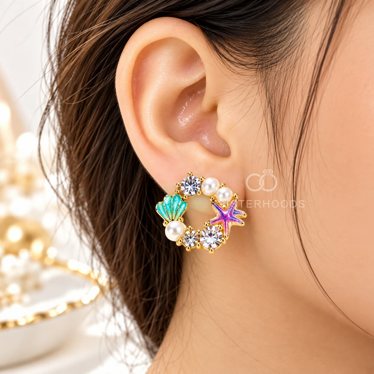 Multicolour pearl stud earrings with turquoise shells, purple starfish and sparkling accents | SISTERHOODS-SHA256:94fb178972ee91391c14108bf00bfedb5069f1345b69c10cf8ced509f96a1068