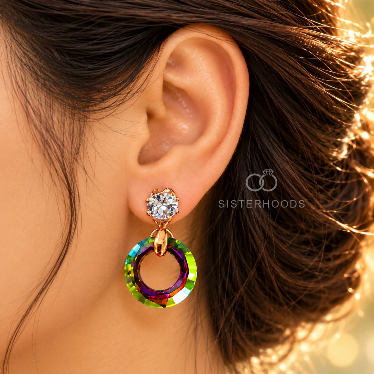 Gold tone dangle earring with a clear faceted top and multicolour circular drop | SISTERHOODS-SHA256:0e1fcbec872992911c35daa1d6b765e13f33771f47203382bcd6672eeefa21bd