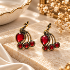 Peacock-inspired dangle earring with red accents and antique gold-tone detailing | SISTERHOODS-SHA256:f679831427fb98e7142f2a0c09586768826fc96e2d257ca63bef606ee854227c