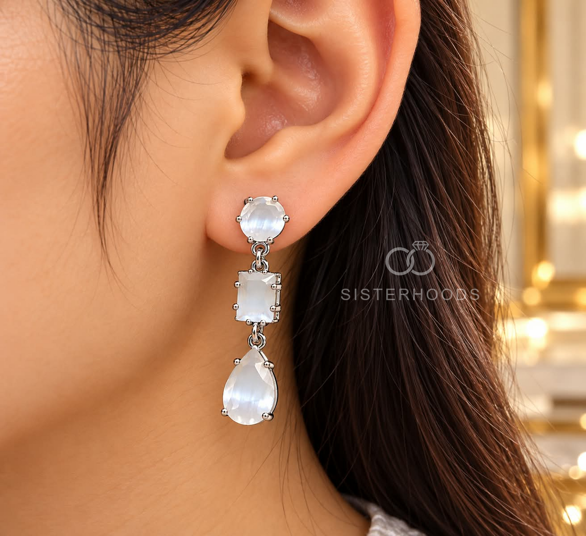 Silver-tone stud-top dangle earrings with round, rectangular and teardrop white faceted accents | SISTERHOODS-SHA256:429ac3f53bd46130c00dd27f09b3ac7df32c3450be7cc8d56a2c0b0dd6784243