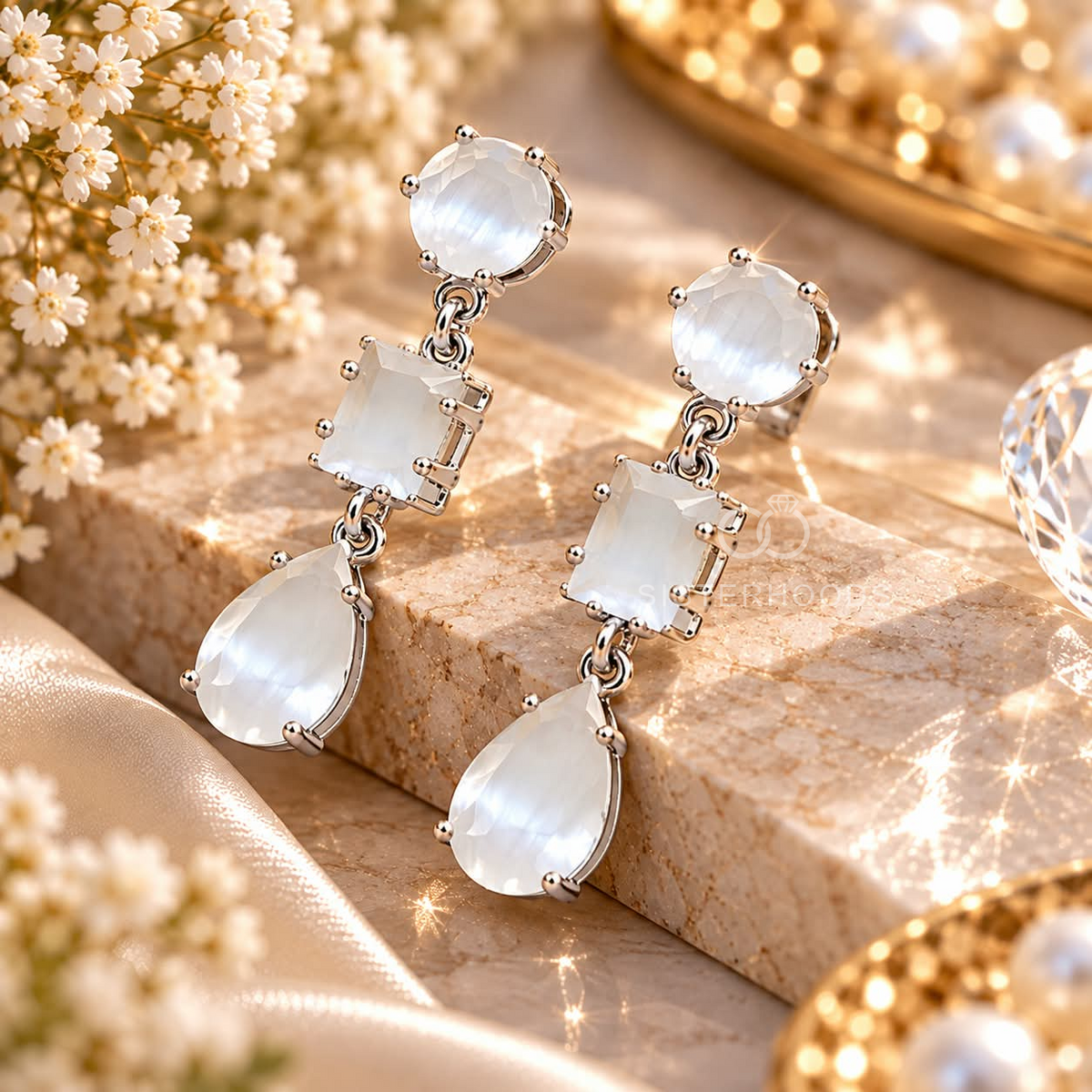 Silver-tone stud-top dangle earrings with round, rectangular and teardrop white faceted accents | SISTERHOODS-SHA256:136188c0c3635029c2d9348e8d5f0b57238f1689fef2c19b200ca590ee8b1716