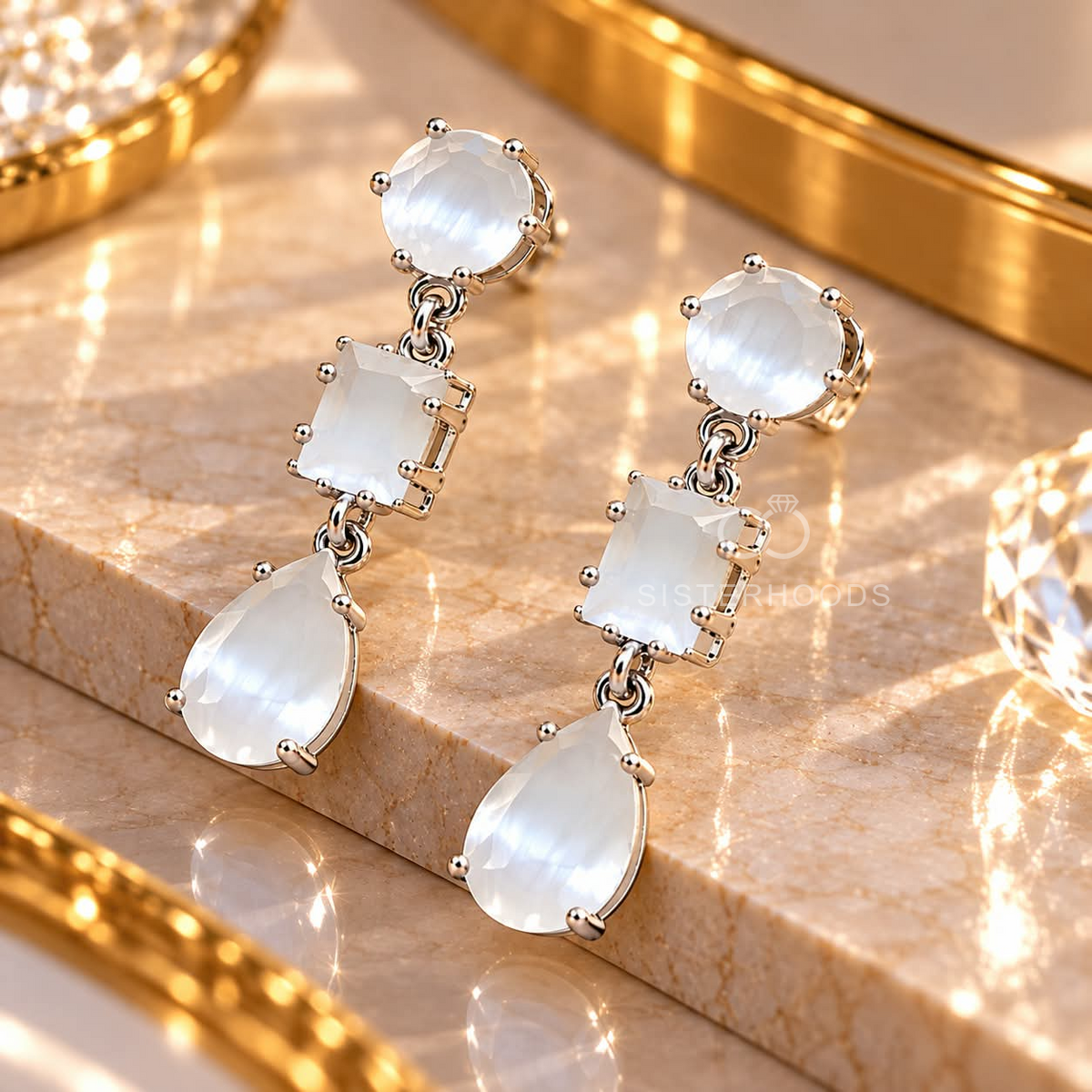 Silver-tone stud-top dangle earrings with round, rectangular and teardrop white faceted accents | SISTERHOODS-SHA256:a9eac07013c3e022cf4b6d421c29de1d6d5cded74445359ffaa2eb44477ba4e4