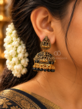 Oxidized temple motif jhumka earrings with black bead drops | SISTERHOODS-SHA256:9e026a064f5d3e9ff8f40785c8f59fadfb21effc473f9c3ed7cfb5f1863ba630