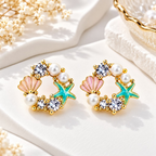 Multicolour pearl shell and starfish stud earrings with sparkling accents | SISTERHOODS-SHA256:535d6804d1271c0254408e05c5a3421463fc8bb0c92bee9f3293f43c0a6d7c04