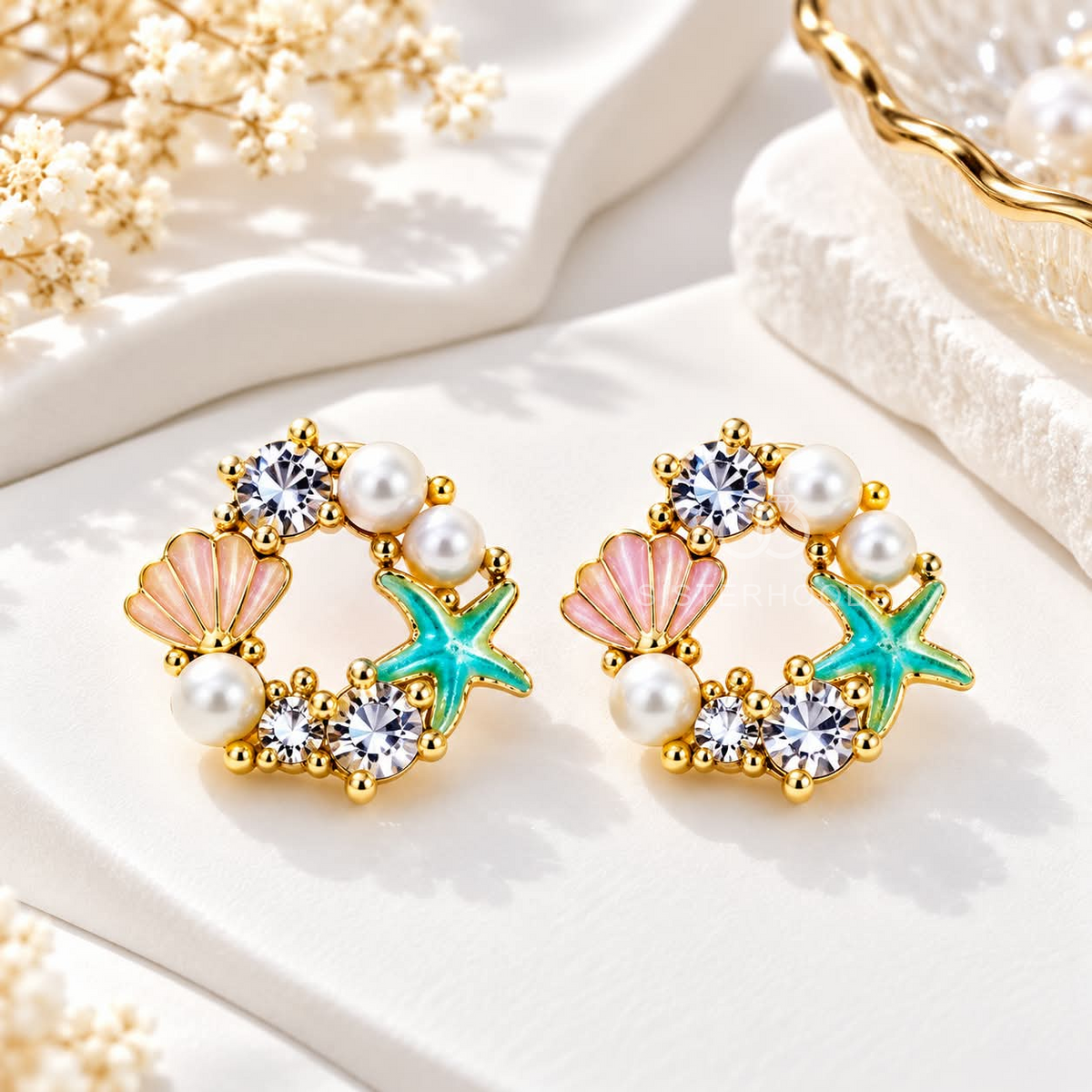 Multicolour pearl shell and starfish stud earrings with sparkling accents | SISTERHOODS-SHA256:535d6804d1271c0254408e05c5a3421463fc8bb0c92bee9f3293f43c0a6d7c04
