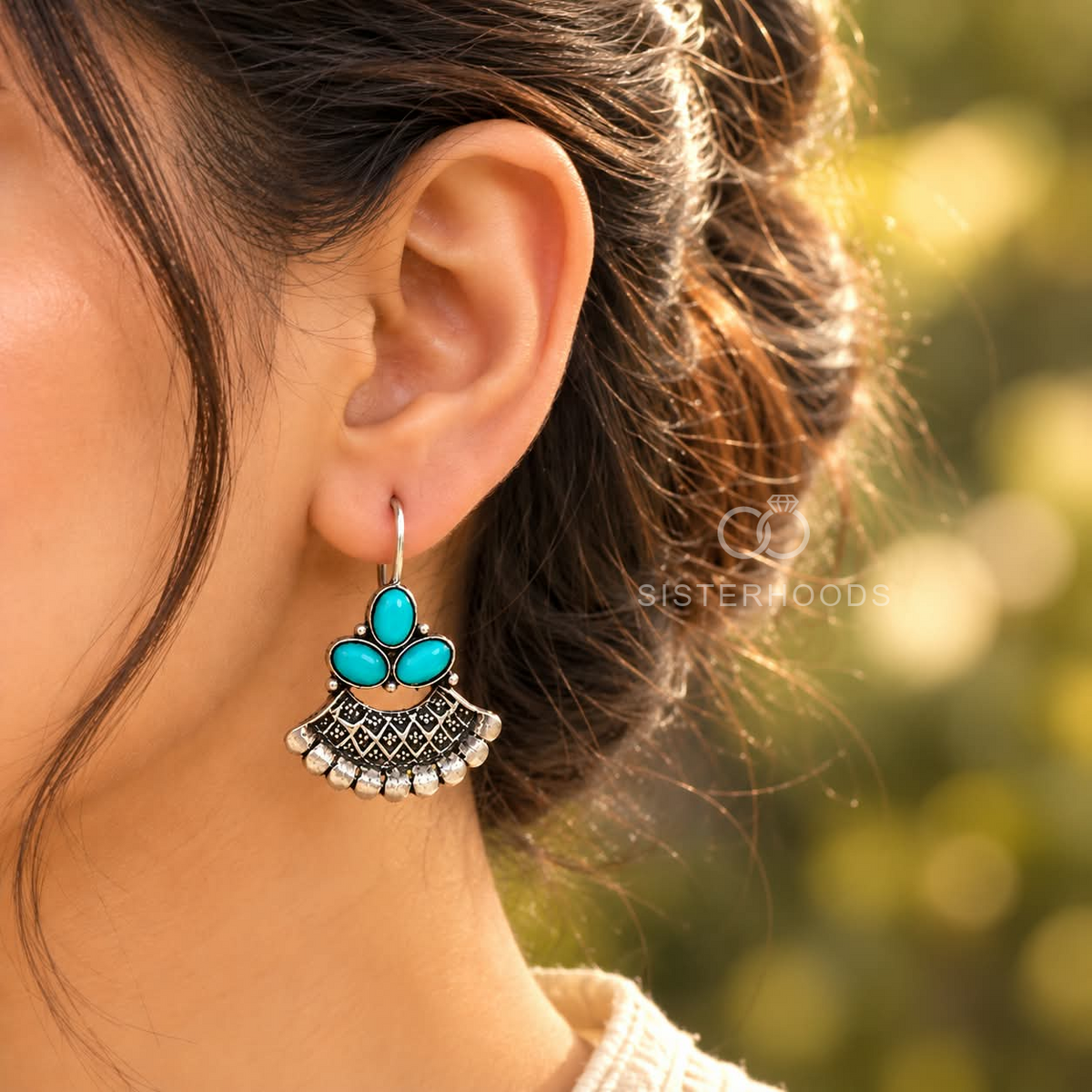 Turquoise three-stone oxidized jhumka earrings with a detailed silver-tone fan drop | SISTERHOODS-SHA256:18380c4f506aedec71eb6d559fa785af8772f069dd8c31d3fd7afc57f0cf9076