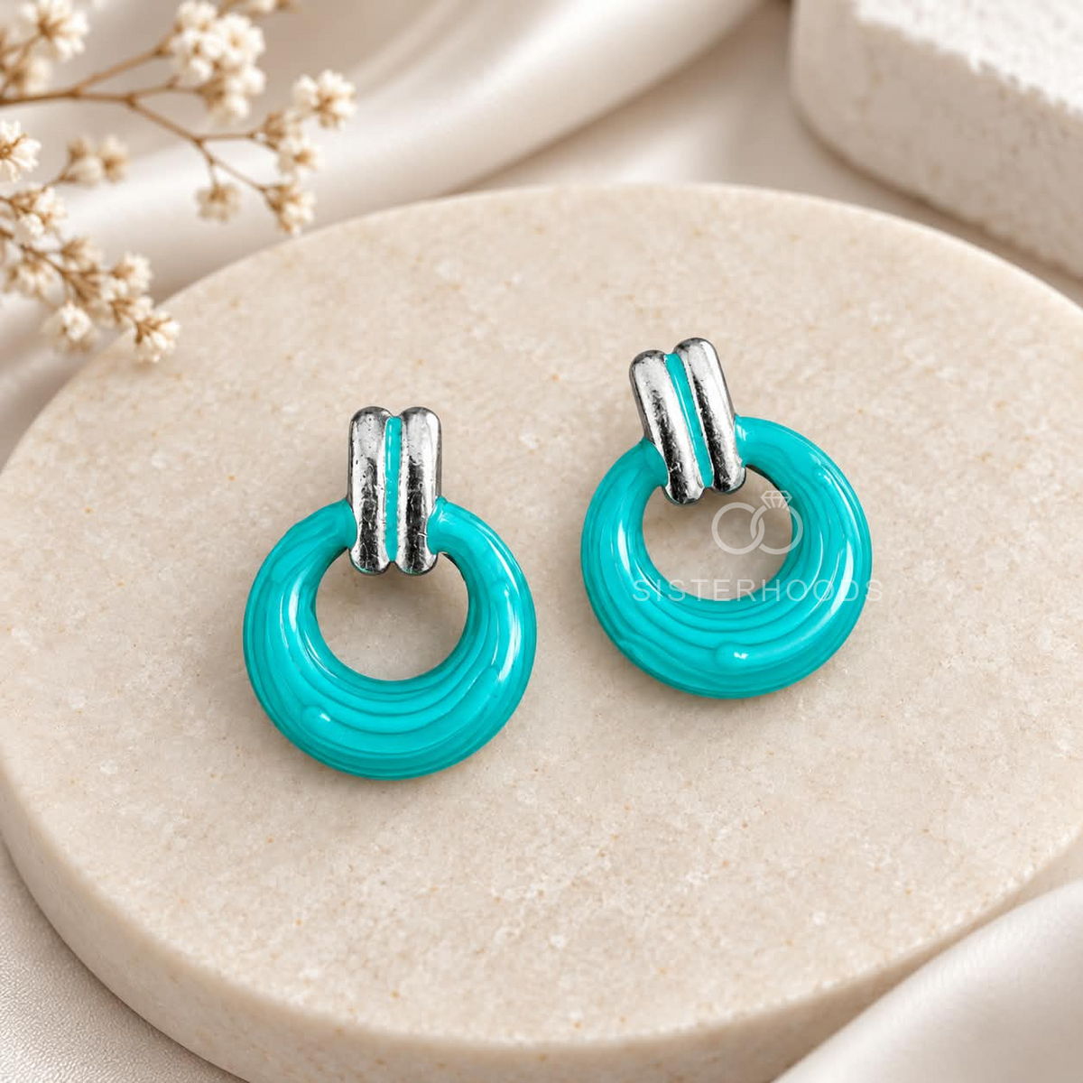 Turquoise circular hoop earrings with silver-colour rectangular accents | SISTERHOODS-SHA256:448d979ead3c42d16bbf2282cc3e6832806259da726d73e03e083e54847c2f17