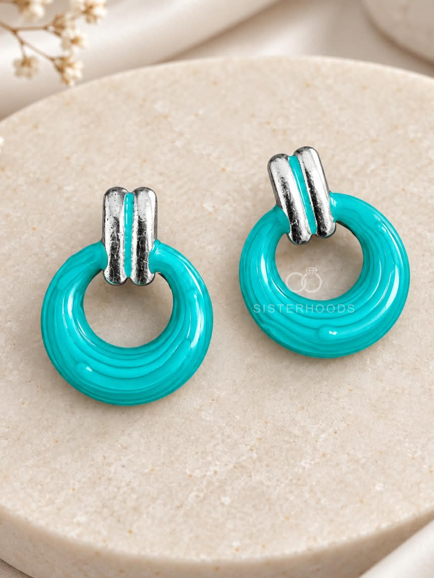 Turquoise circular hoop earrings with silver-colour rectangular accents | SISTERHOODS-SHA256:22caf95c372bdbba4b9f39e8a30323b7bba02a9a6f5a8b141e74c1876461ac0c