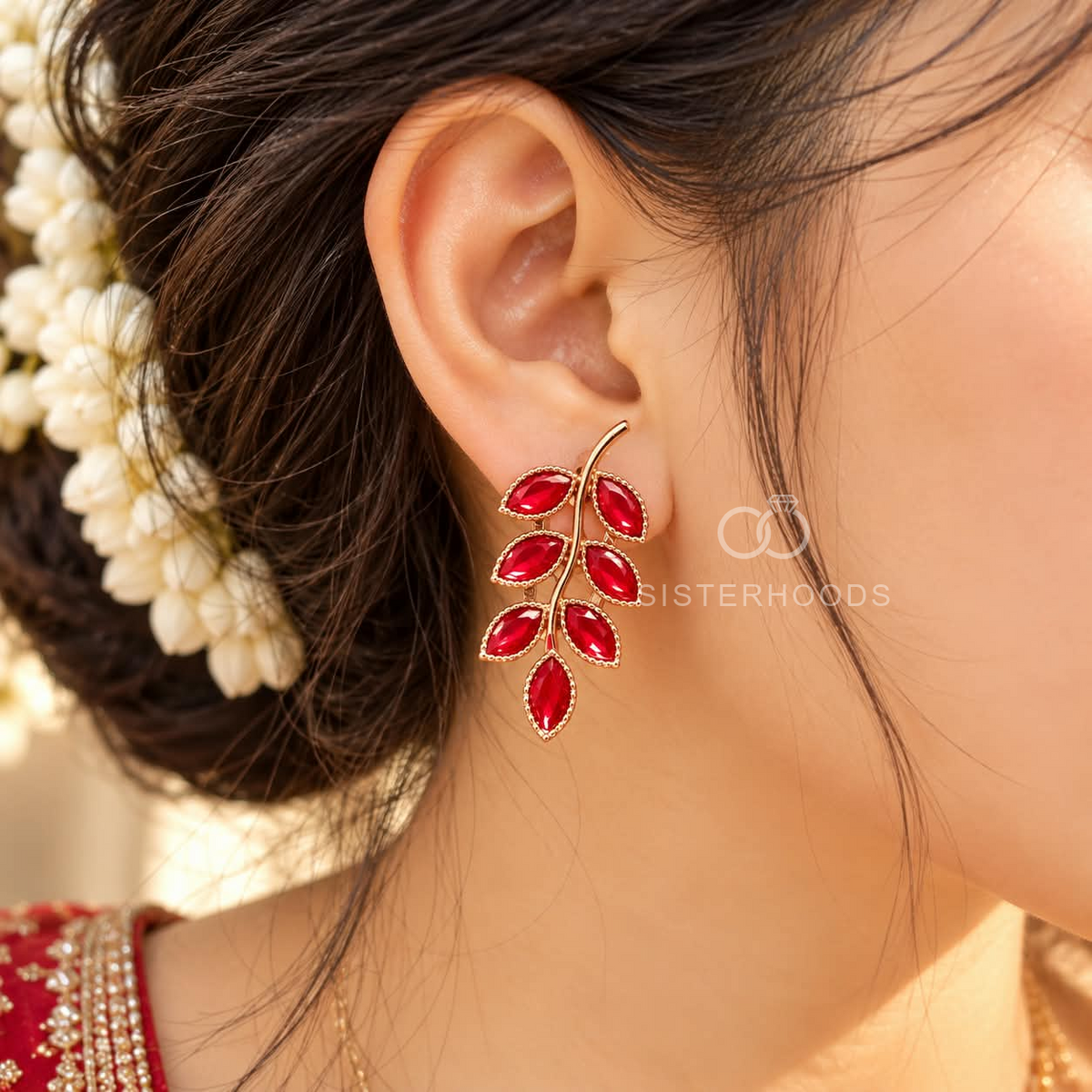 Red faceted leaf branch stud earrings with a curved rose gold-tone design | SISTERHOODS-SHA256:94bd3c17421c39a5a4e20a9a86eea2b7983a022552280769001bc4847a735d1f