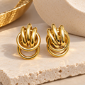 Gold-tone interlocking loop stud earrings | SISTERHOODS-SHA256:0b47aabc2cd9f58936efdd17ac3c0a1c25c101af2ca7cd04cc6dfa1be2fc1723