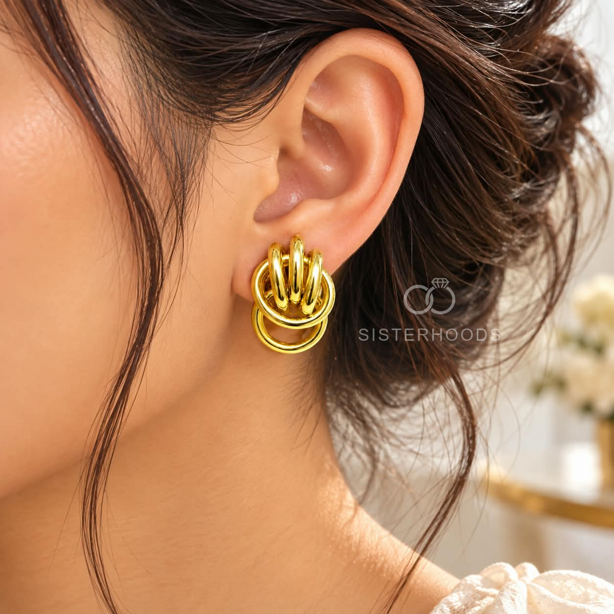 Gold-tone interlocking loop stud earrings | SISTERHOODS-SHA256:860d501590807c55bc2d9e7cf6d6474cd724fb21b5dff1c253bef2c0db498a24