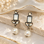 White accent oxidized geometric dangle earring with leafy details and a round white bead | SISTERHOODS-SHA256:238cacf3404df71417b3fcc7c20c31c4e632df1b79fcba74f9a7718daec416bc