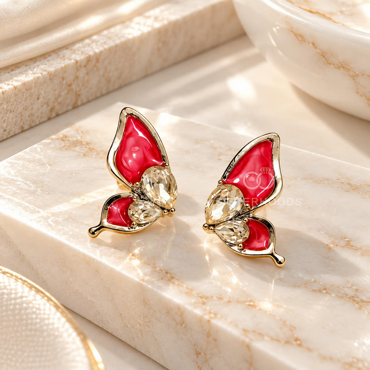 Red wing-shaped stud earrings with clear faceted accents | SISTERHOODS-SHA256:105205e7dededa672e275a1f6af287ff279a1c1ebae580b5f57ef652fc5314f0