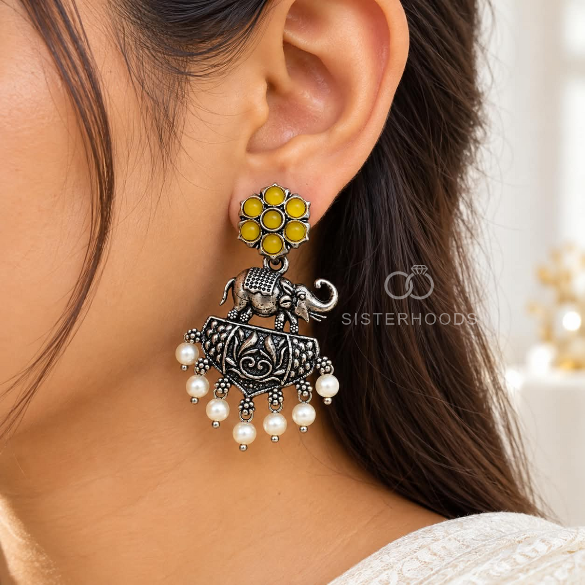 Oxidized elephant motif jhumka earrings with yellow stones and pearl drops | SISTERHOODS-SHA256:39cd773ad25b85d760bdbc740a67f02ae0c90d6bbf44a3e116739b5a9ce06dfe